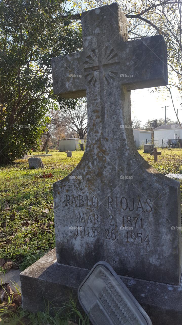 Cross shaped gravestone at San Jose Cementario, Austin,Texas.