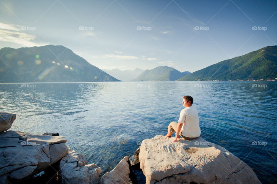 Couple on the bay at sunrise