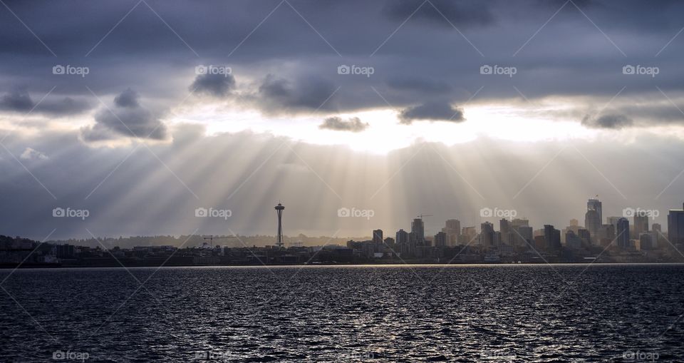 Sunrays over Seattle skyline.