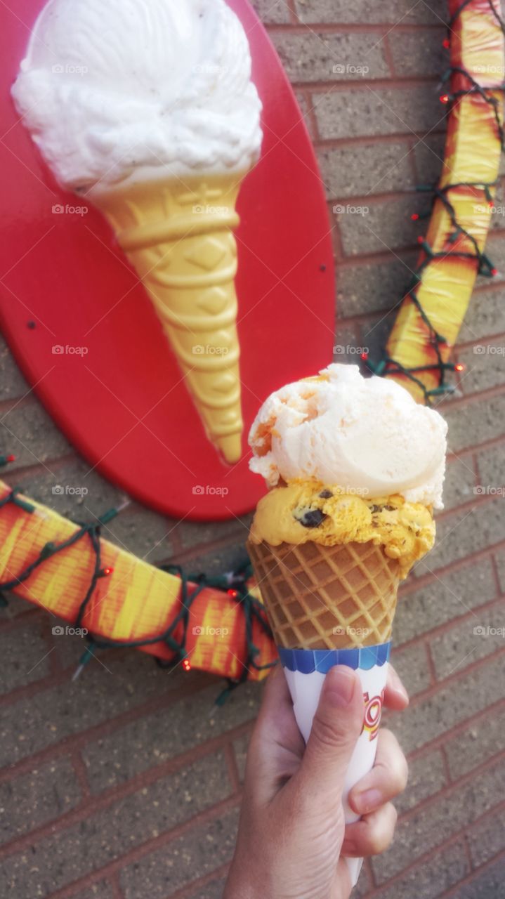 Hands Holding Ice Cream 