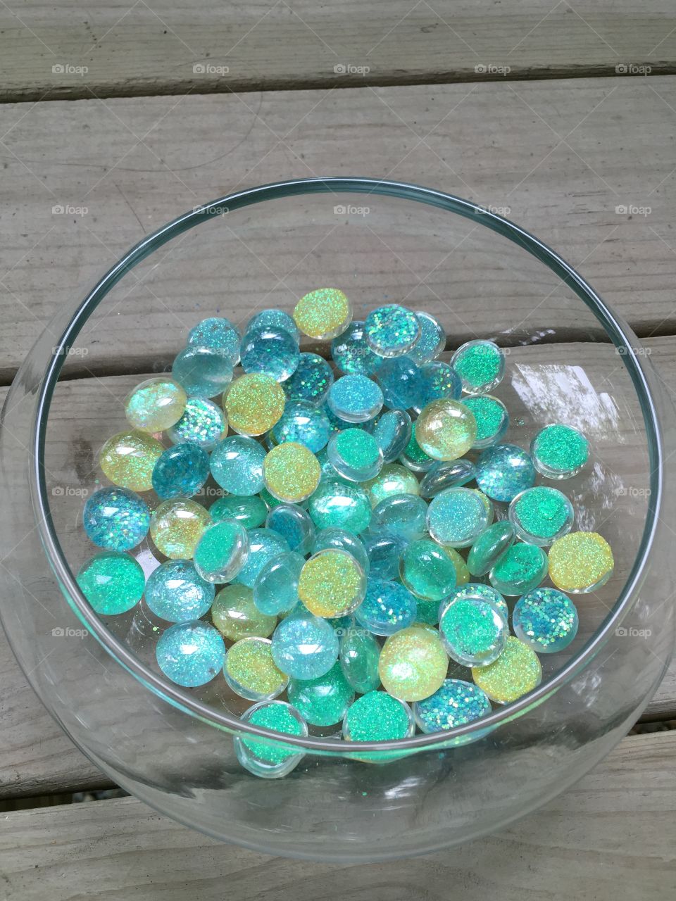 Sparkle stones. Glass bowl full of sparkle stones