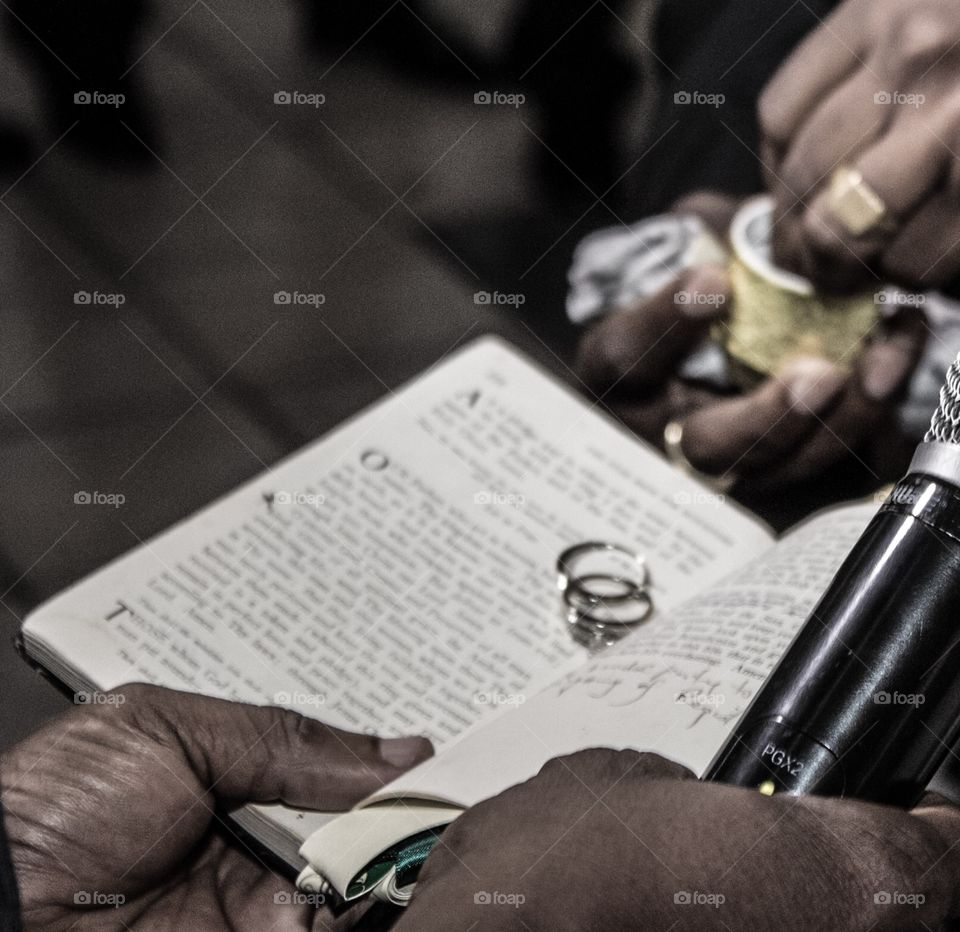 Rings in a Bible at a wedding 