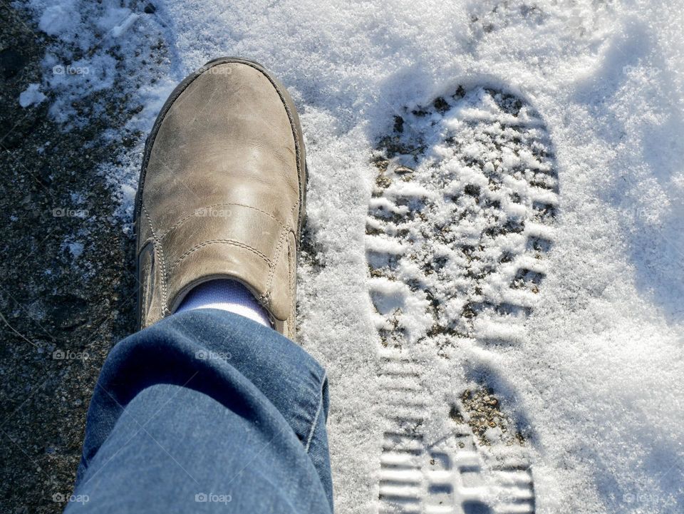 Footprint in the snow. Could be my son’s, but could be my own. 