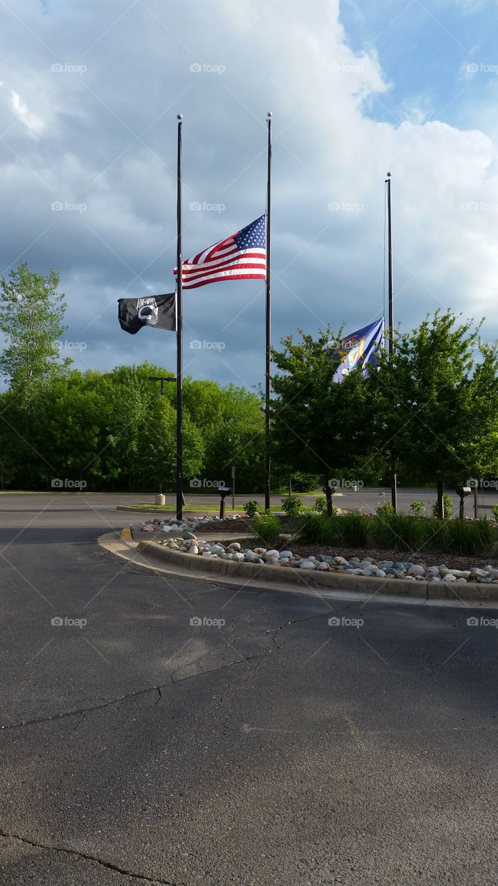 half staff. Memorial Day and a Michigan soldier is mourned