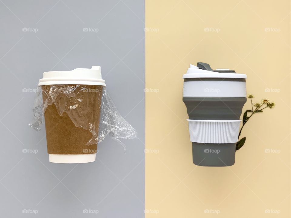 Disposable coffee cup vs reusable mug, ecology concept, recyclable waste