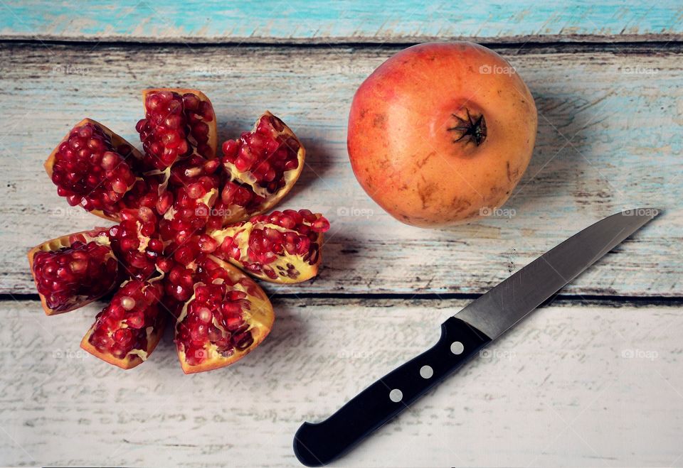 Pomegranate on a wooden table