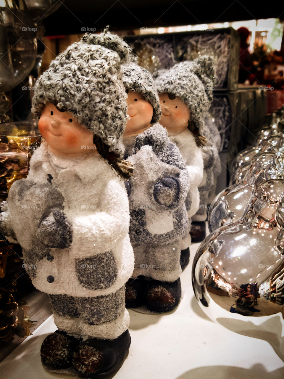 A detachment of souvenirs.  Girls in winter clothes