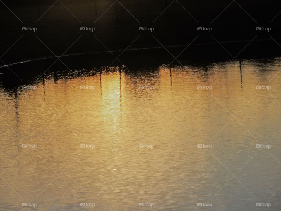 sunset in water reflection