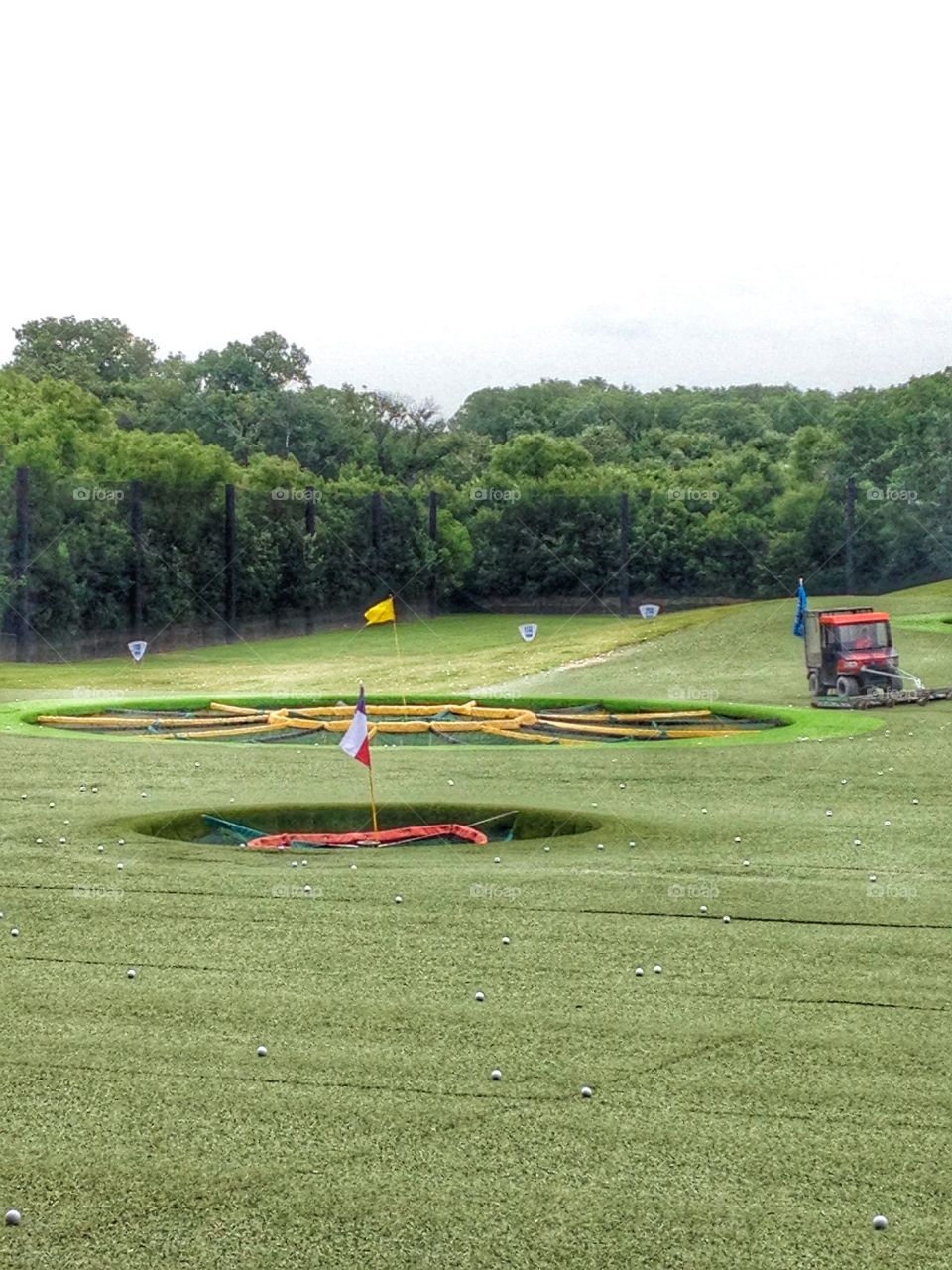 Ready, aim, FOUR!. Top Golf course