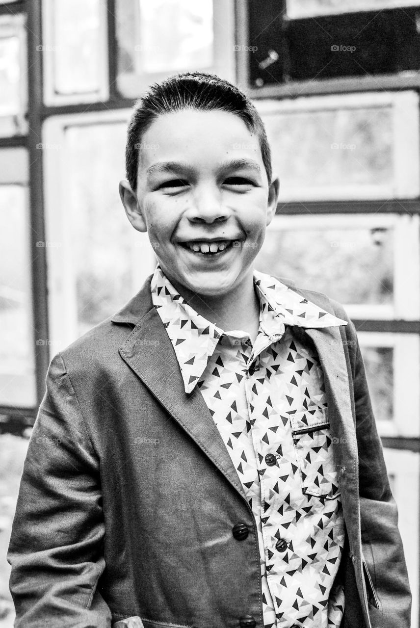 Boy smiling into the camera 