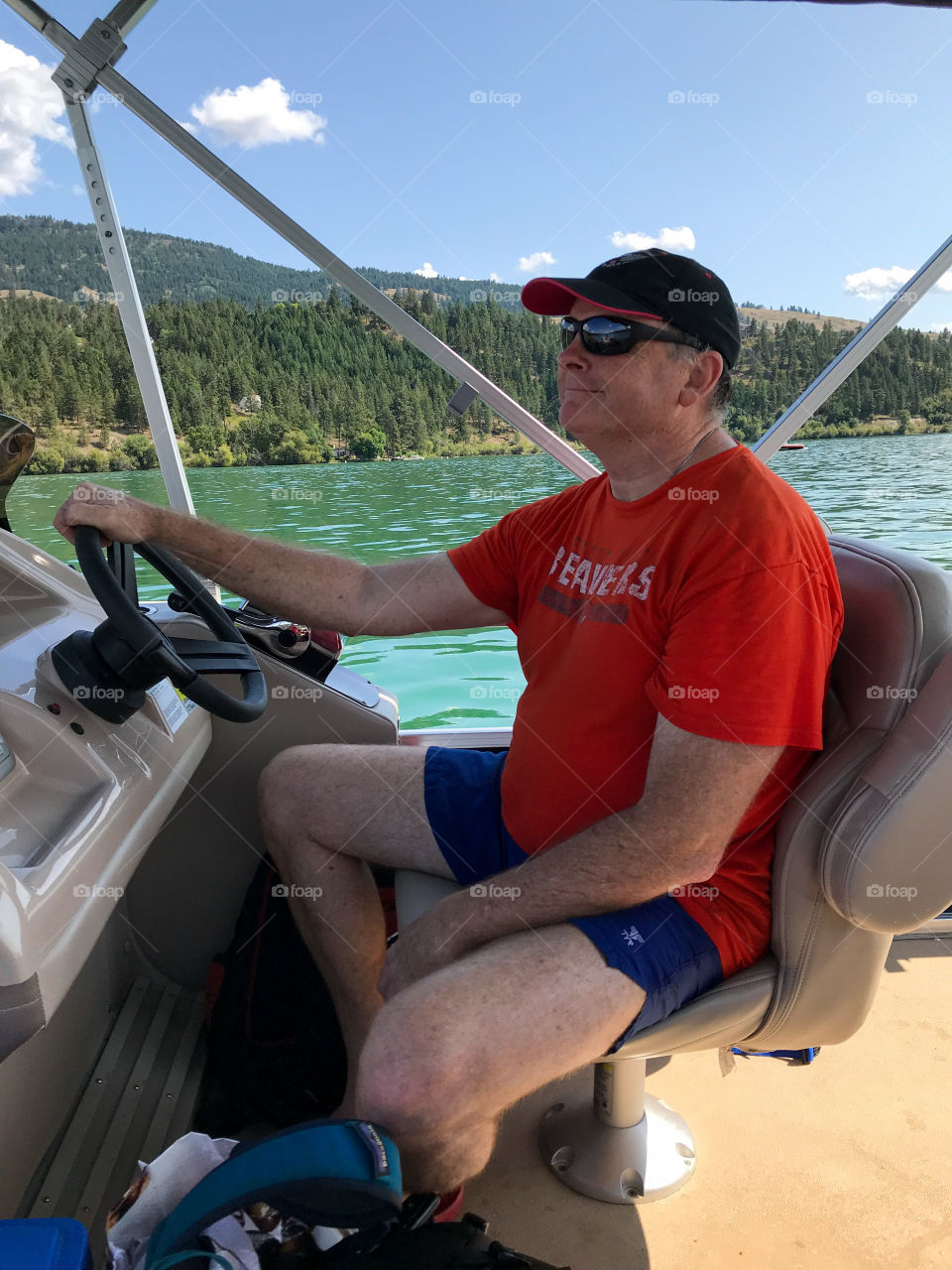 We rented a pontoon boat this summer to play out on the emerald green lake. It was blazing hot but there was shade over part of the boat & the lake was cool. We all swam, the dogs too, & we towed a float over the waves. The ship’s Captain was happy! 