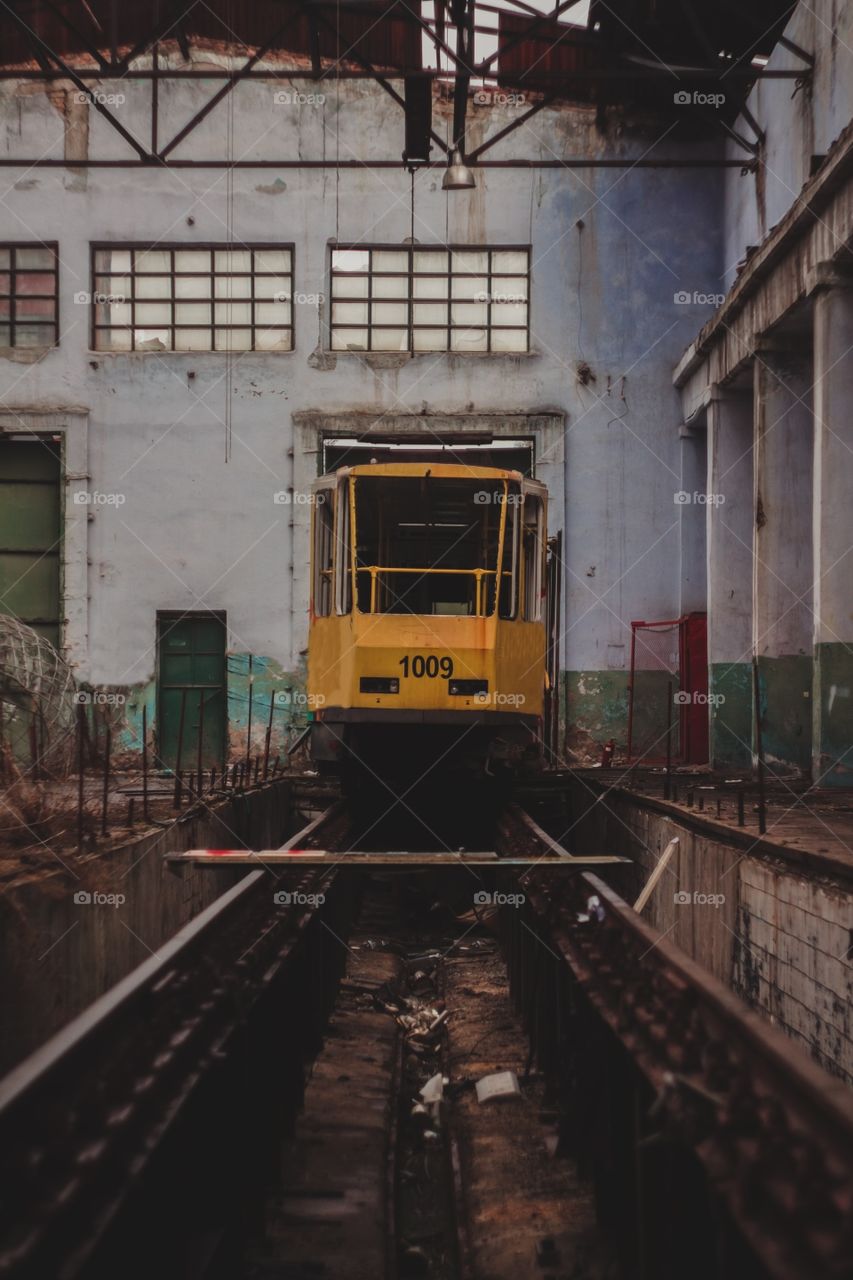 old tram in an abandoned depot