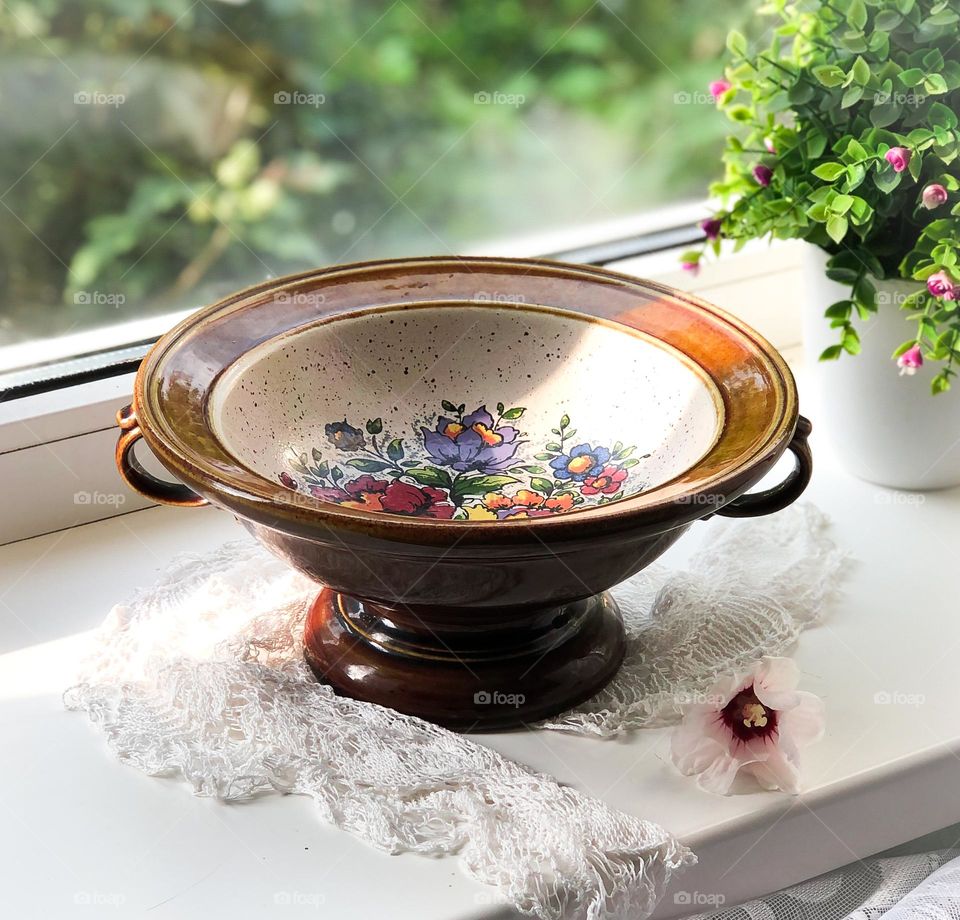 Antique ceramic fruit bowl with floral decoration