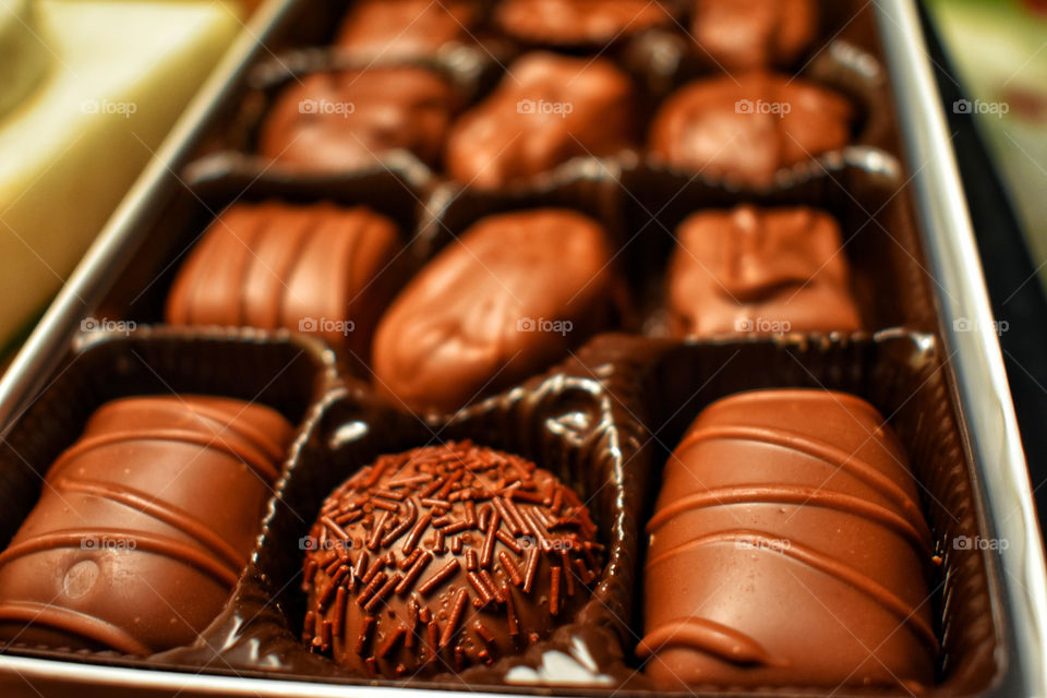 Assortment Of Fine Dark And Milk Chocolates In A Box Closeup