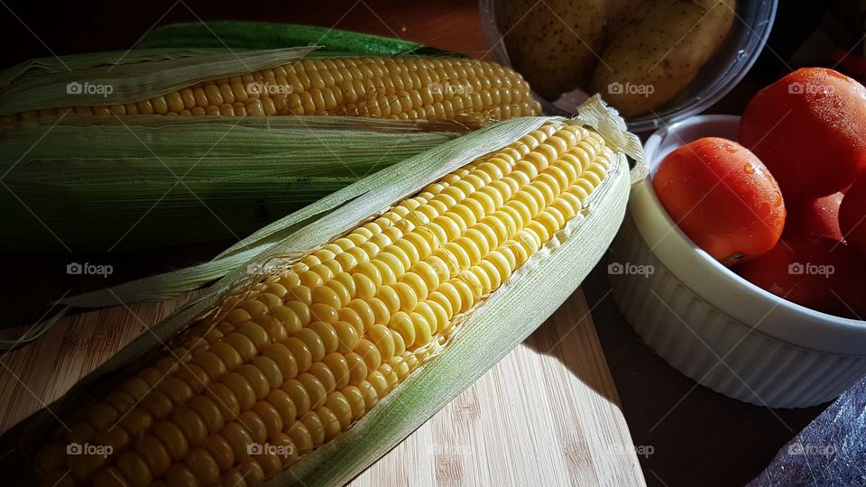 corn, tomato and potato