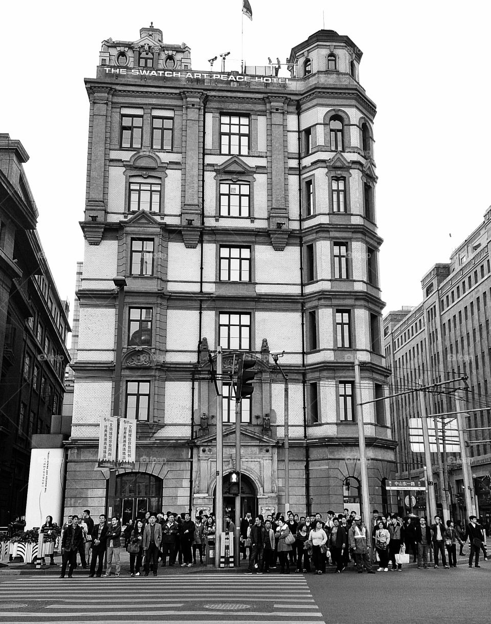 Crossing. This is one of the European style buildings in The Bund area in Shanghai.