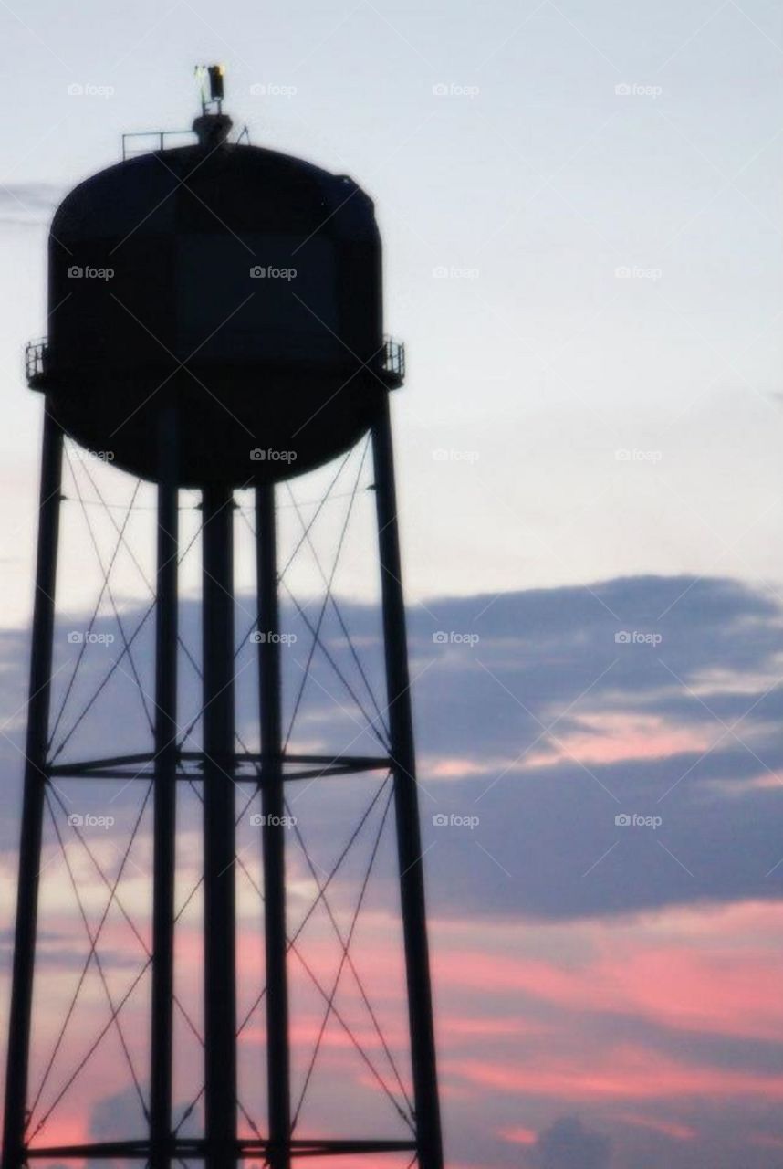 Water tower at sunset