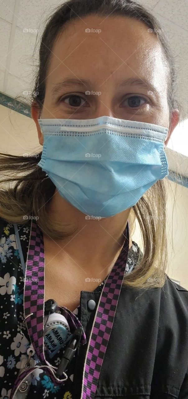 Young Nurse Wearing a Mask