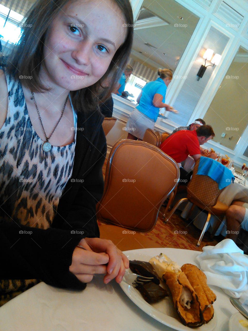 Beautiful girl, yummy deserts. Shot of my beautiful niece enjoying deserts at an muscular dystrophy event....