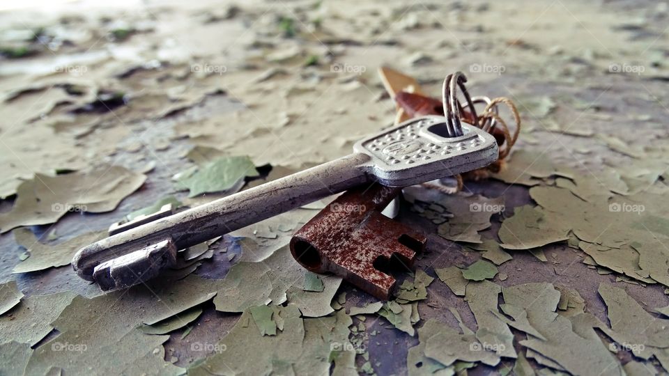 Keys from something old on a cracked surface