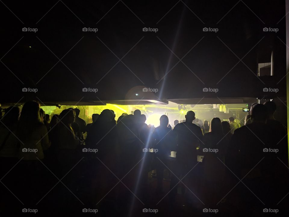 yellow rays in the rock concert