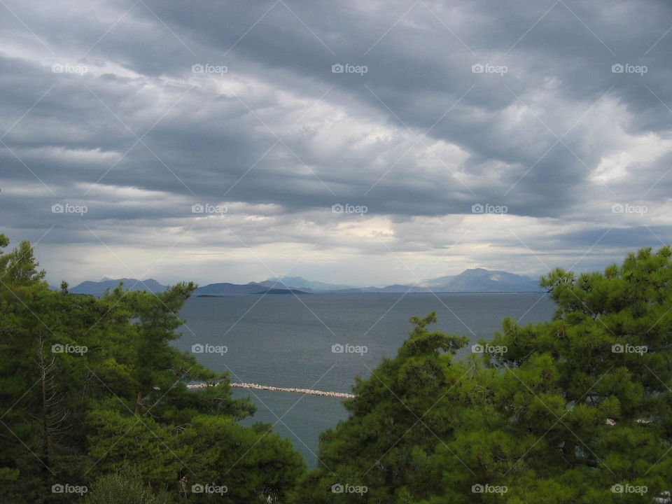 Storm clouds over idyllic lake