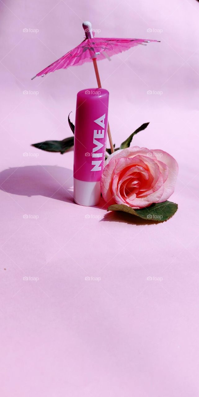 I always use Nivea Rose Lip Balm to protect my lips from chapping during vacations .