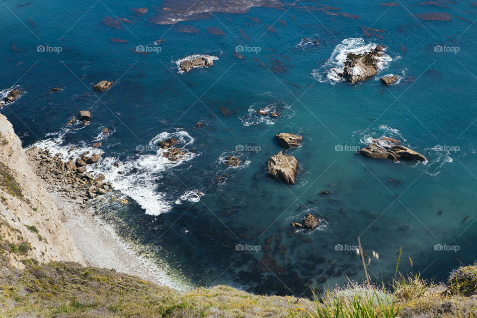 Rough terrain of the pacific ocean shoreline off Highway one in California