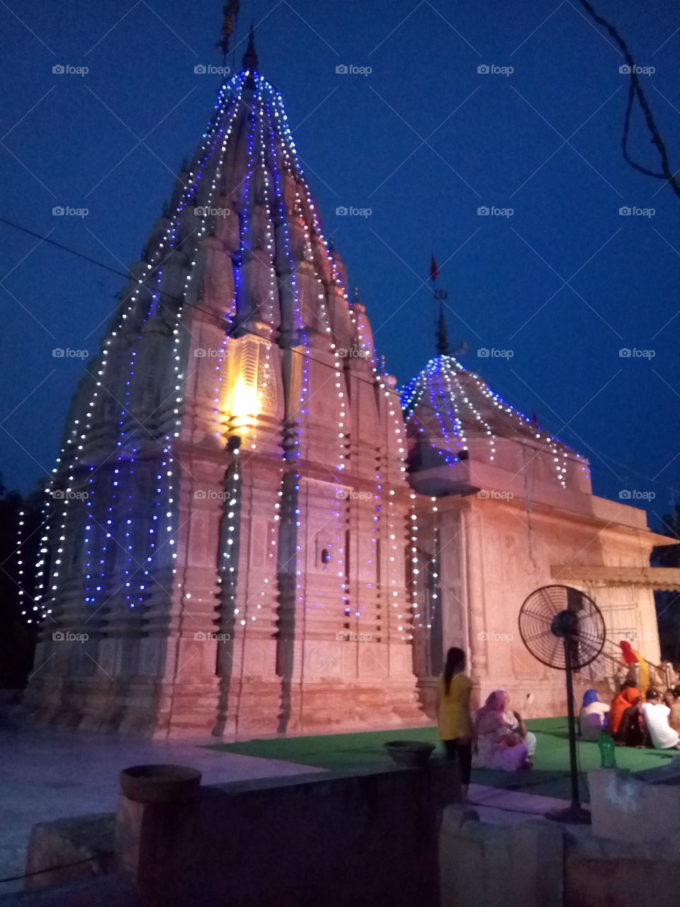 A queue of Lord Shiva's devotees in a temple at Patiala city. India