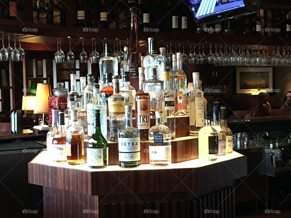 Liquor alcohol bottles behind the bar