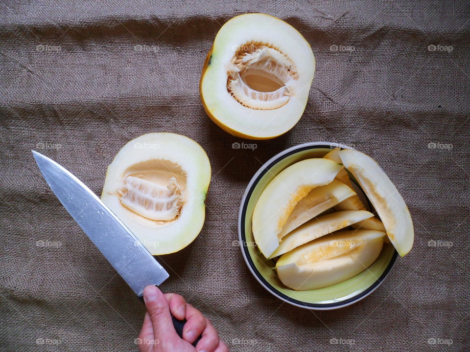 sliced ​​melon lie on the table