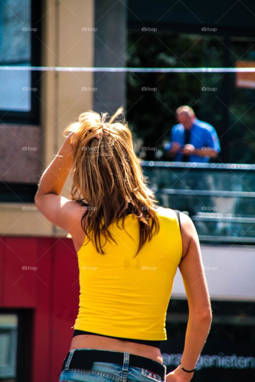 Girl in yellow shirt