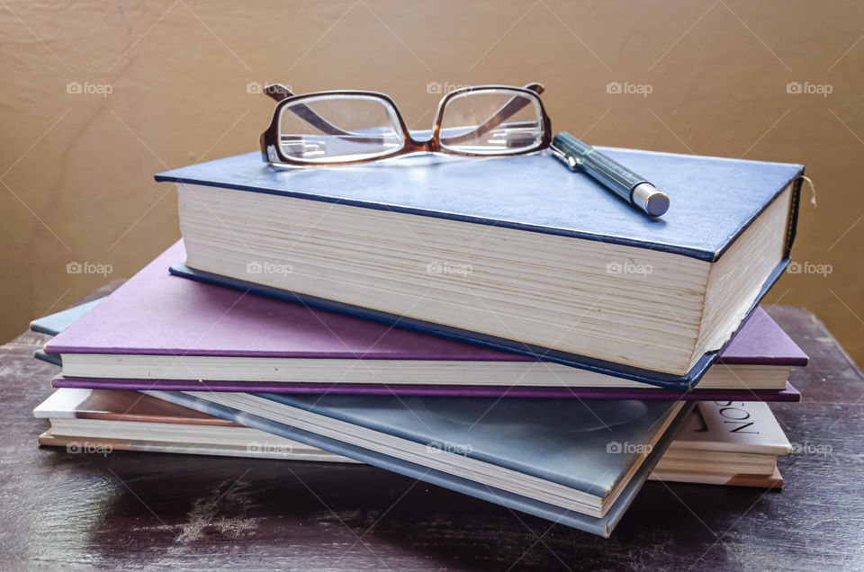 Stack Of Books In Natural Lighting