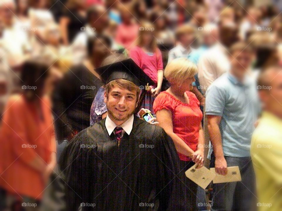 Portrait of smiling graduate student