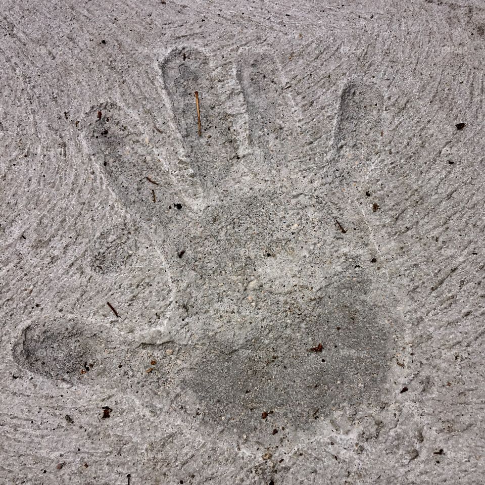Hand print 🖐 in cement.
