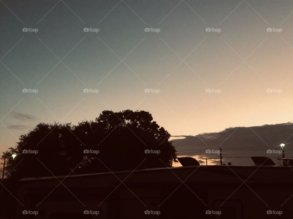 Good Early Morning Can You Here the Crack Of Dawn. Beautiful Green Hues Some Yellows turning to Pink Hues just making Sunrise More Special.