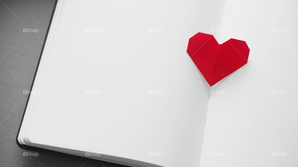 Heart paper on notebook