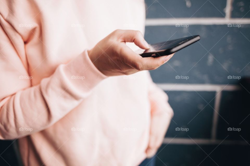 Close up of a man using mobile phone