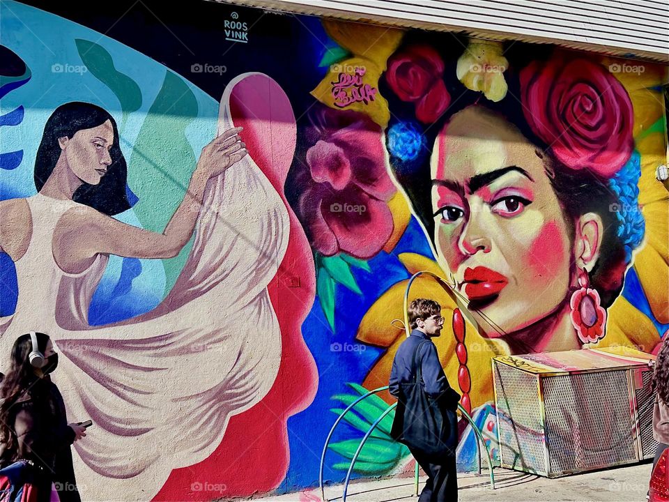 This is one half of an oversized art mural on „Jefferson Street“ off „Broadway“ in „Bushwick“, Bklyn showing a mulatto Latina from NYC. 2024. Hypnotic Productions