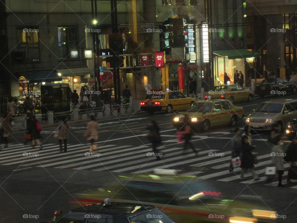 Ginza, Tokyo, Japan. Night View Street Crossing, People and Traffic, Taxis