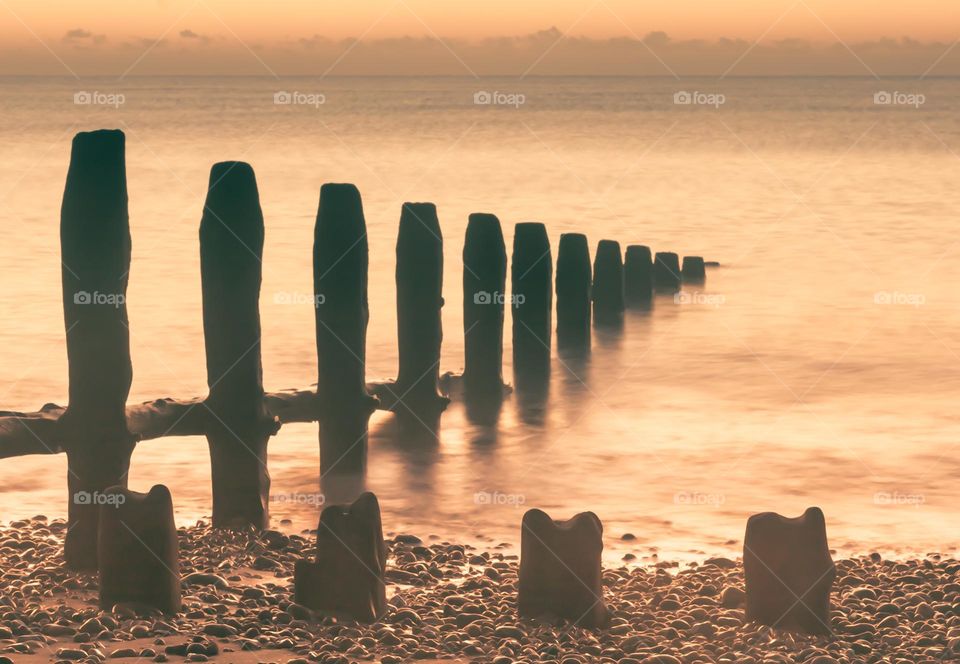 Just after sunrise on Winchelsea beach among the wooden groynes 