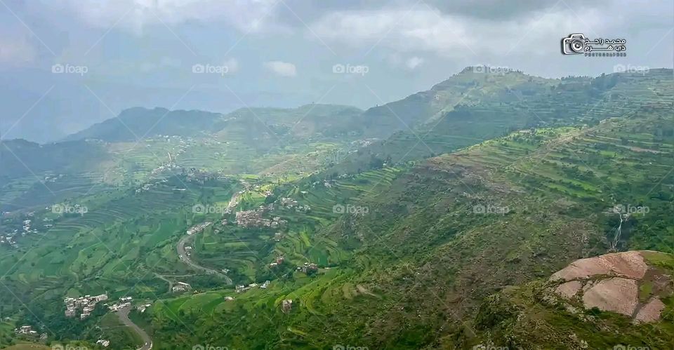 Glory be to God, the magnificent and picturesque view and the natural green trees are a view that is nothing more wonderful than it