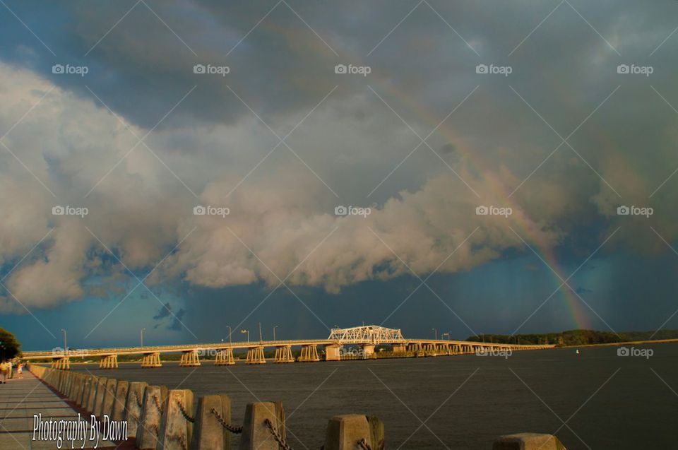 Rainbow over bridge