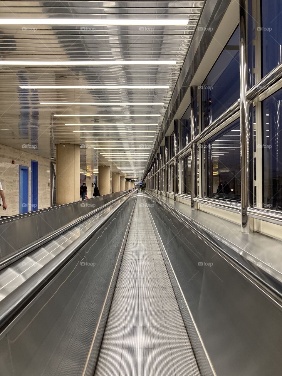 Long moving walkway at the airport 