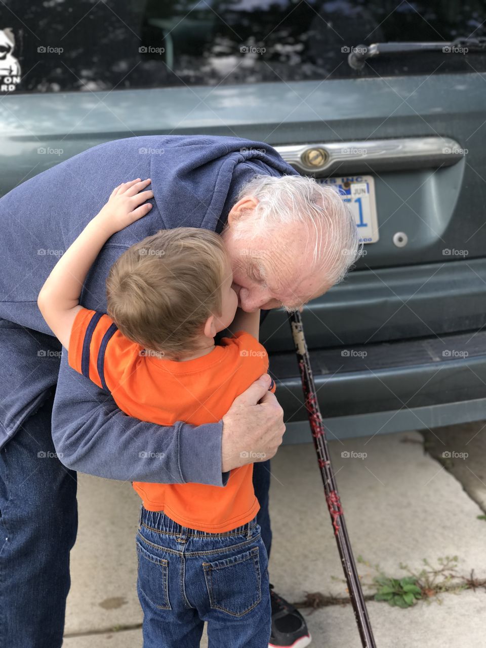 Grandfather and grandson goodbye