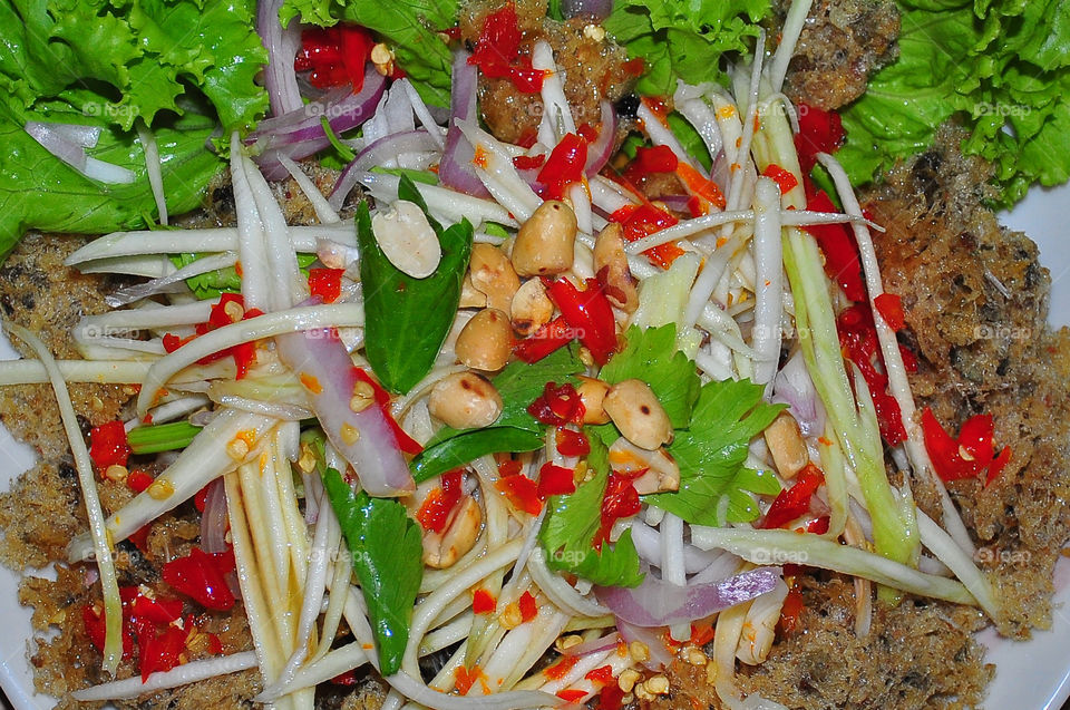 Crispy catfish salad with green mango