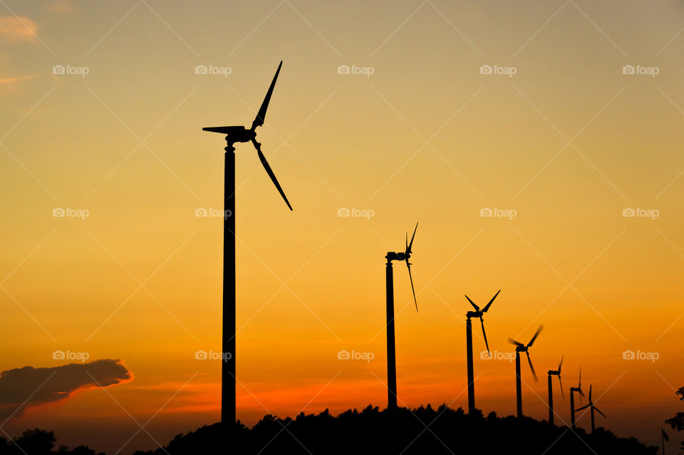 Row of windmills . Row of windmills captured at golden time