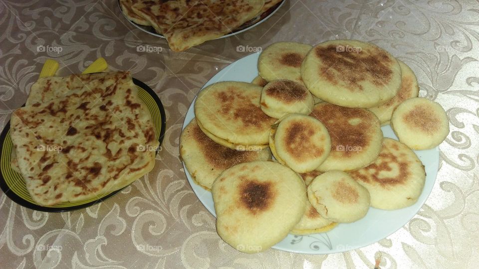 Various bread on table.