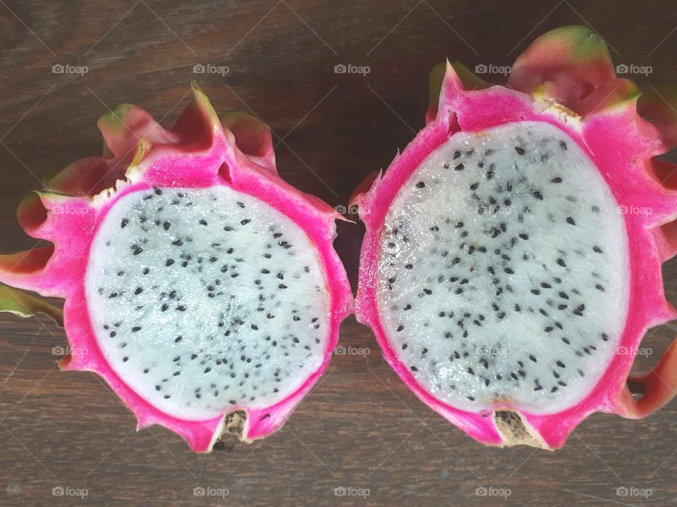 Half cut fresh dragon fruit