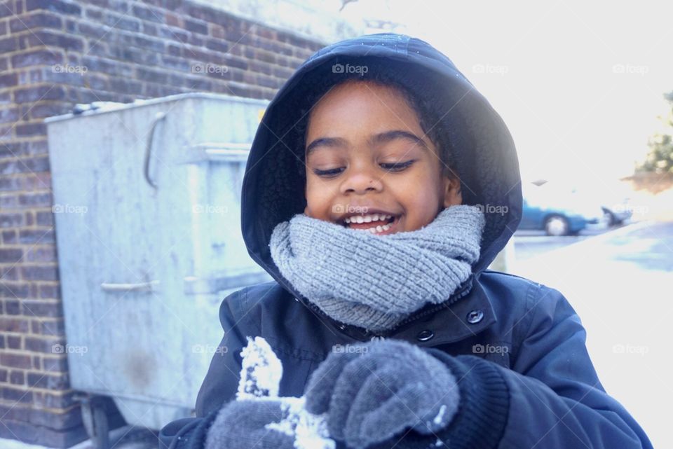 My son excited about playing in the snow